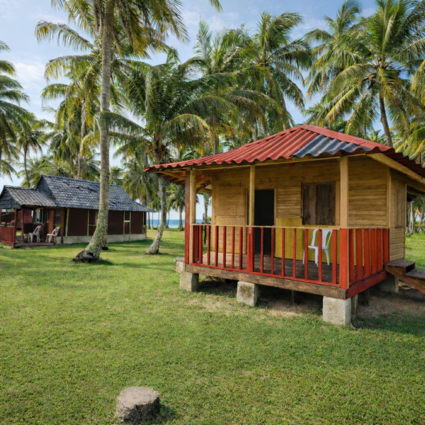 Private beachfront cabin in Isla Aguja, San Blas Islands Panama with white sand beach and turquoise Caribbean water
