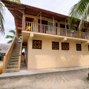Isla Perro San Blas beachfront building exterior wooden cabins tropical island