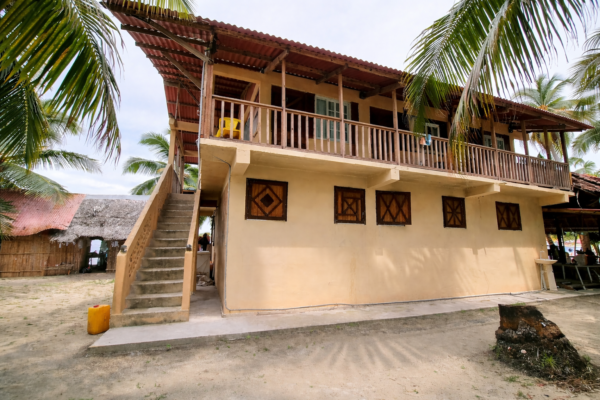 Isla Perro San Blas beachfront building exterior wooden cabins tropical island